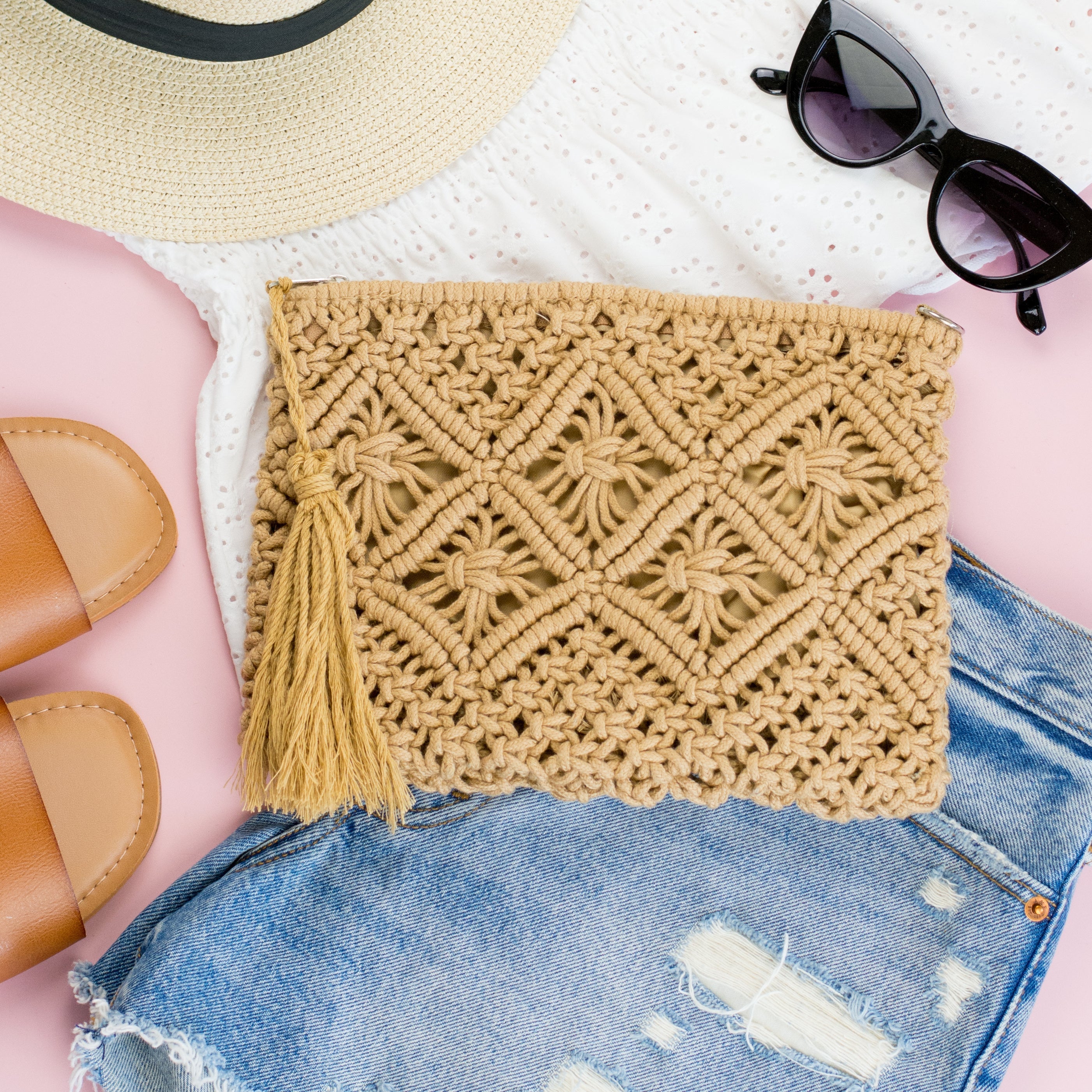 Tan Macrame Woven Clutch with tassel accent and zip closure and inside lining