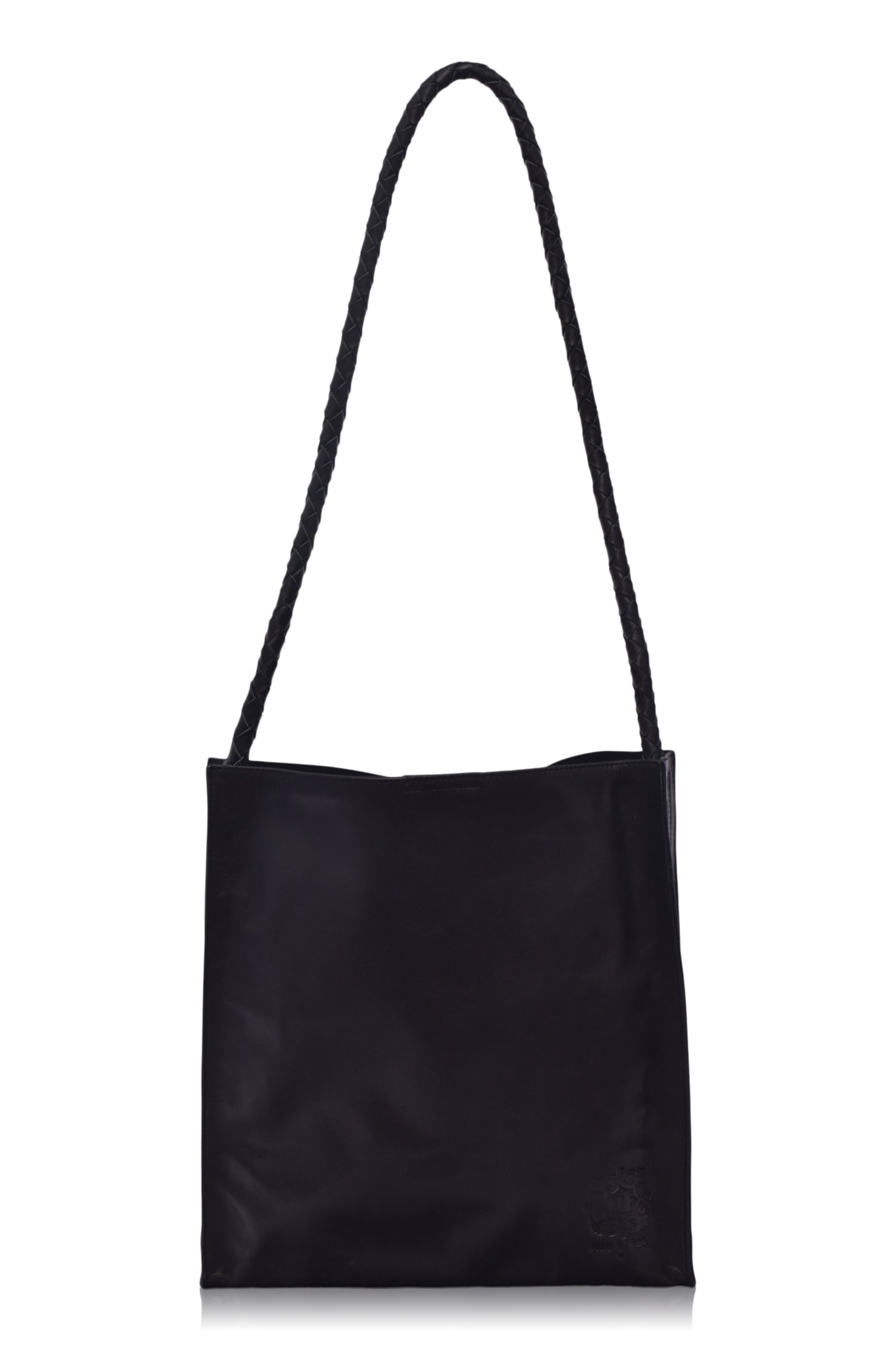 Black leather tote bag with a strap on a white background