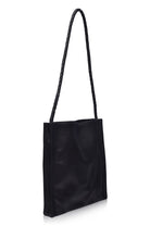 Black leather tote bag with a handle on a white background