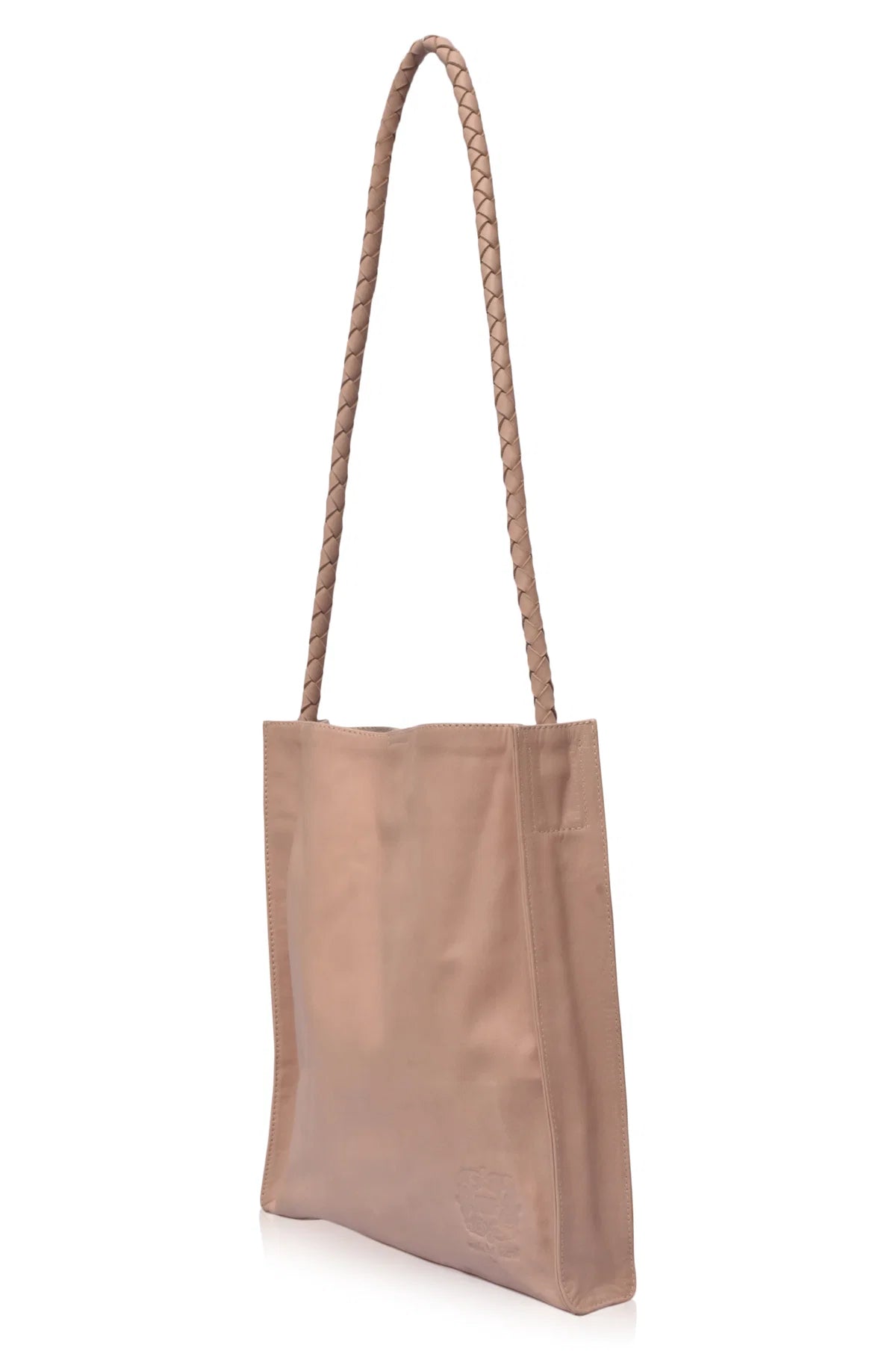 Beige leather tote bag with a rope handle on a white background
