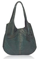 Handbag with woven pattern on a white background