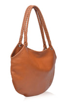 Camel leather handbag with braided handles on a white background