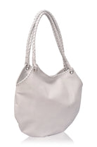 A white slouchy shoulder bag with braided rope handles and silver-tone hardware, shown on a plain white background.