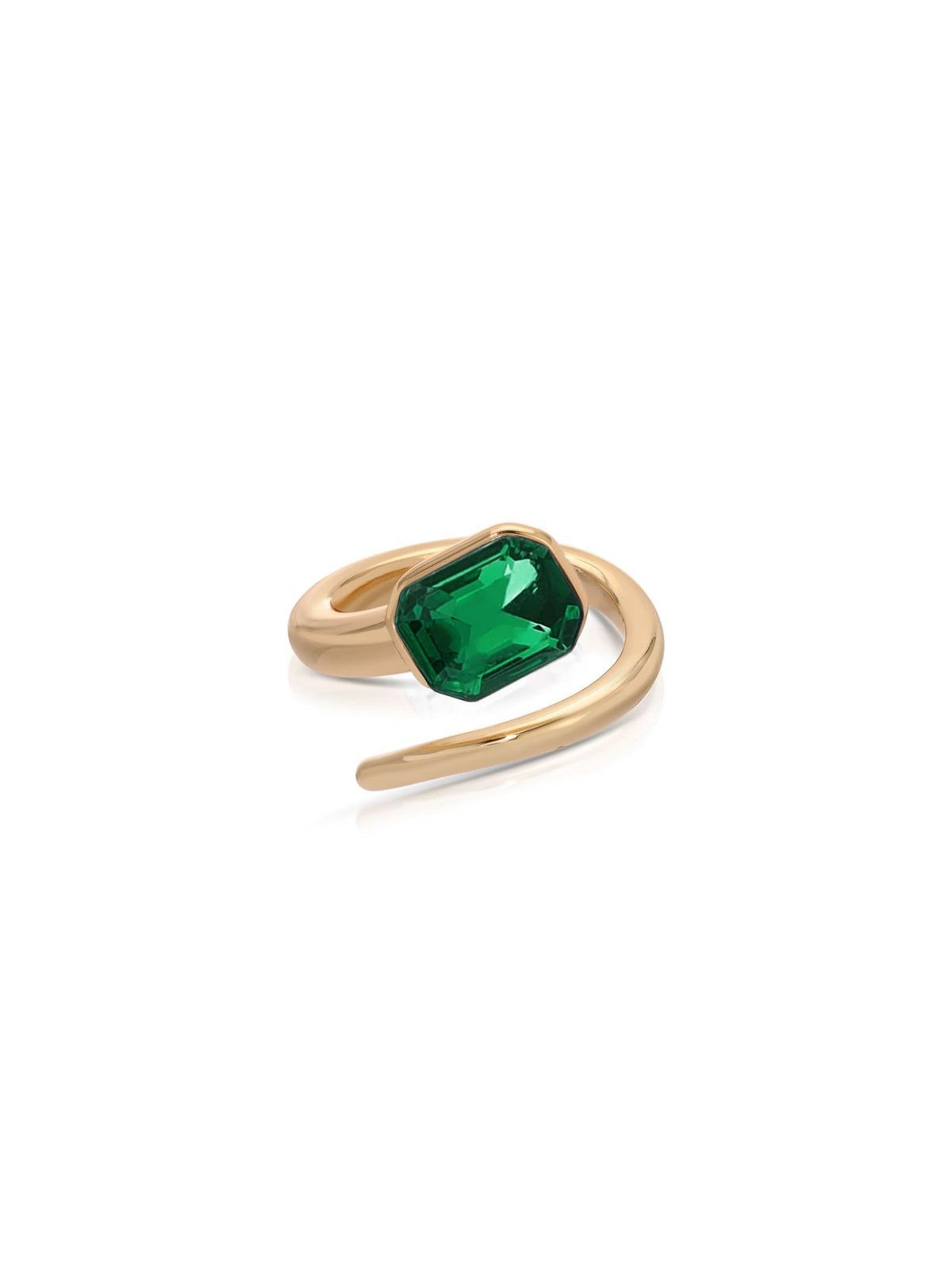 Gold-tone open wrap ring with rectangular green glass crystal on white background.