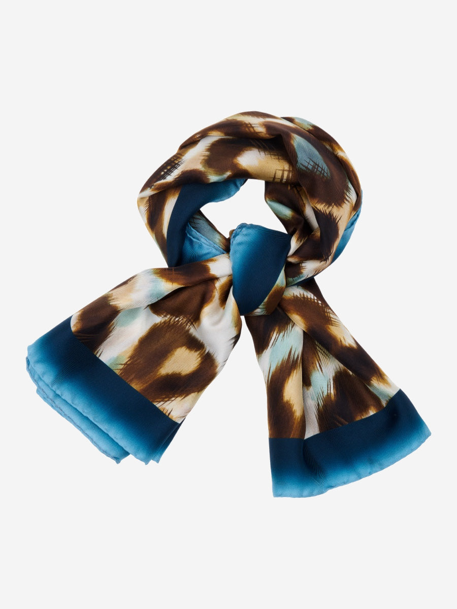 Scarf with leopard print and blue edges on a white background