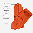 Orange leather driving gloves with text detailing features on a white background