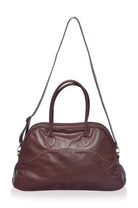 Brown leather handbag with a shoulder strap on a white background