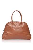 Brown leather handbag on a white background