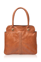 Large tan leather tote bag with braided detail on the front on a white background