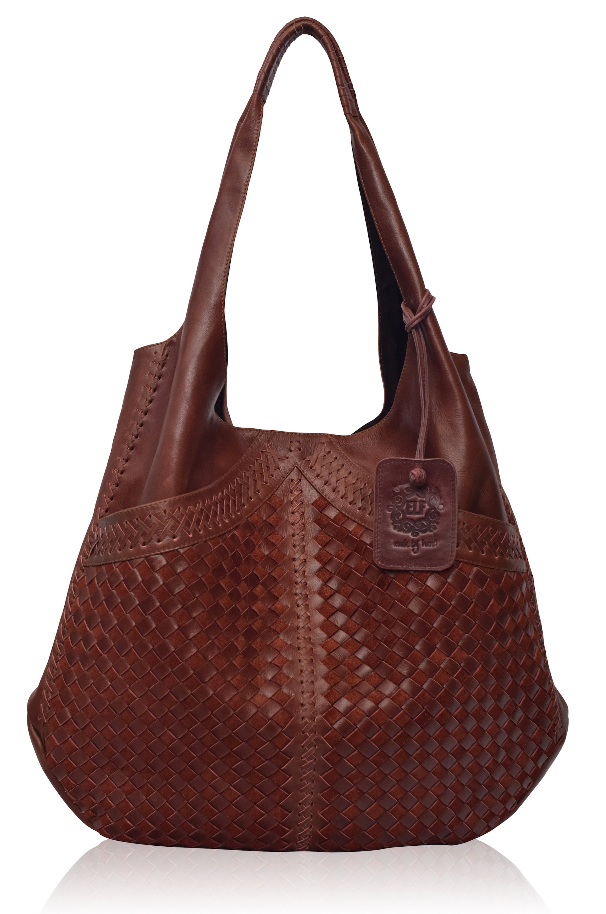 Brown leather handbag with woven pattern on a white background