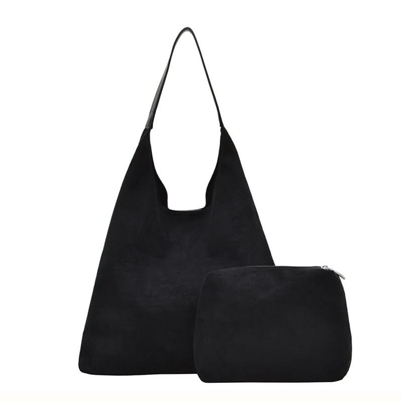 Black suede-look hobo bag with matching pouch on white background.