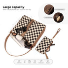 Open checkered hobo bag showing roomy interior and matching wristlet pouch.