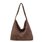 Dark Brown suede handbag on a white background