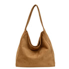 Camel handbag on a white background