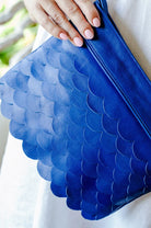 Cascade Leather Crossbody Clutch in royal blue genuine leather with scalloped detailing
