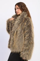 Side view of Montana Wild Faux Fur Coat showing long shaggy faux fur texture and oversized collar.