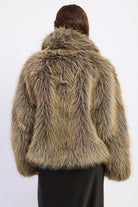 Back view of Montana Wild Faux Fur Coat featuring mixed earthy tones and relaxed hip length silhouette.