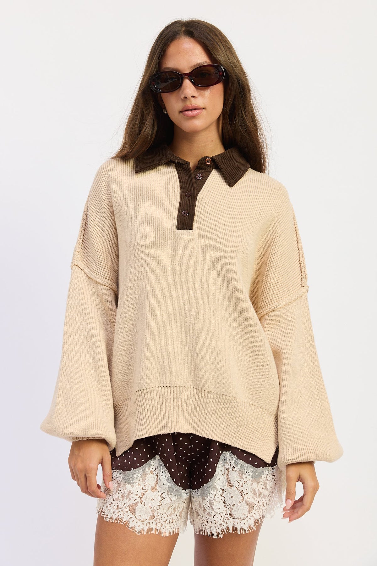 The Weekend Club Collared Knit Sweater in oatmeal with chocolate brown ribbed collar and button neckline, front view.