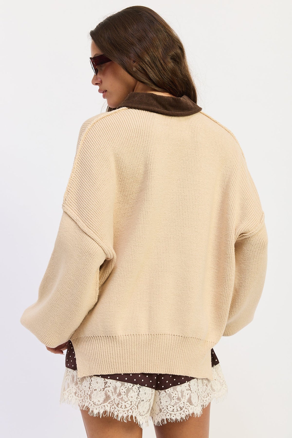 Back view of oatmeal Weekend Club Collared Knit Sweater showing exposed shoulder seams and ribbed hem.
