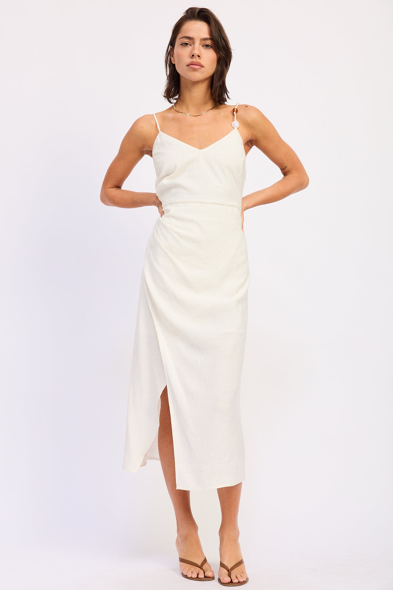 Maren white linen blend midi dress with beaded shoulder strap and wrap style skirt
