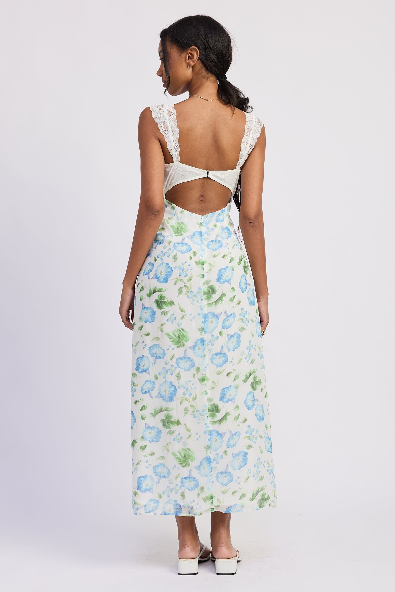 Back view of Something Blue Floral Chiffon Maxi Dress showing open back with hardware clasp, AVAH