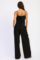 Back view of Marlowe Black Wide Leg Pants showing relaxed wide leg silhouette and full length hem.