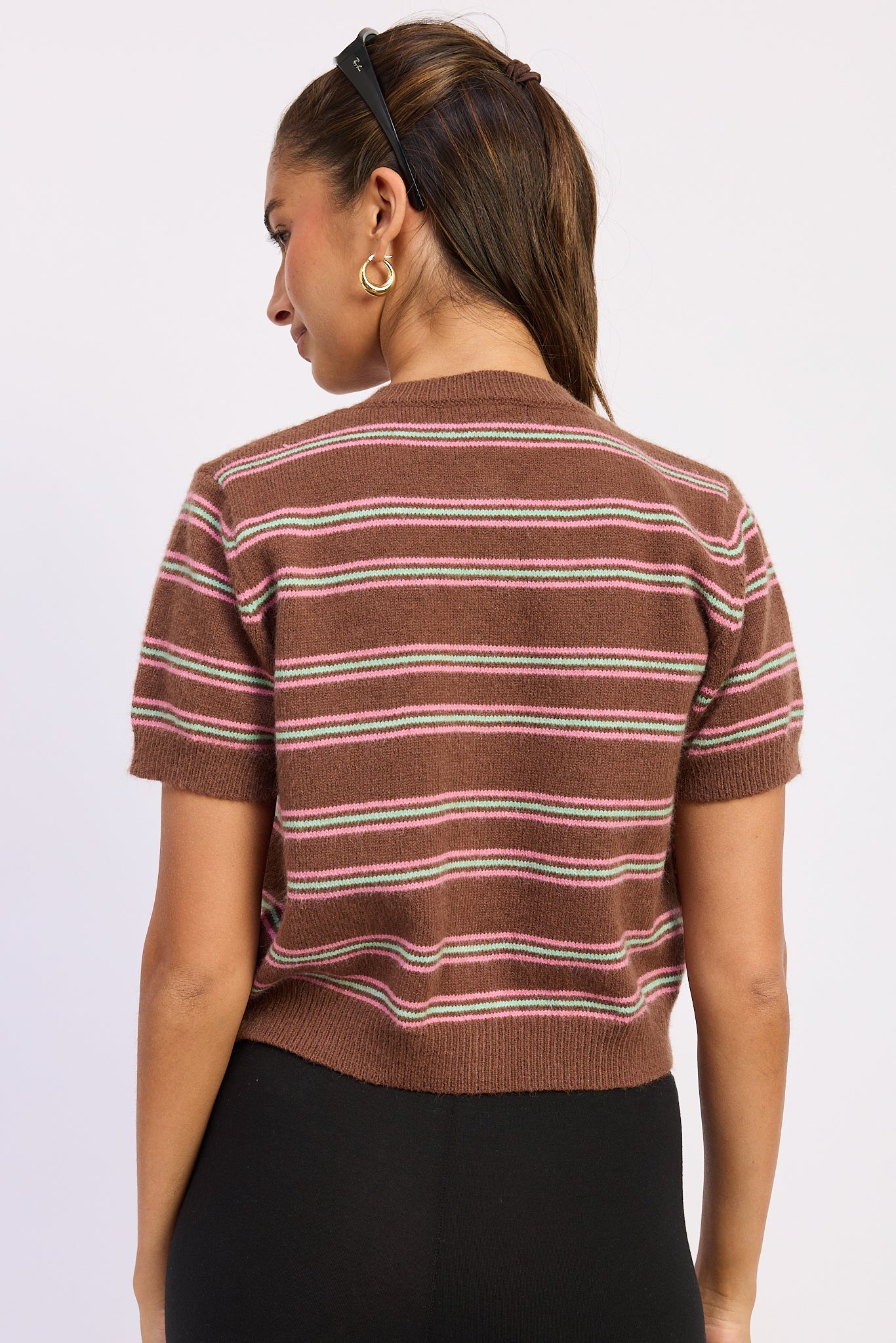 Back view of Varsity Lines short sleeve cardigan in Brown Combo showing horizontal pink and green stripes.