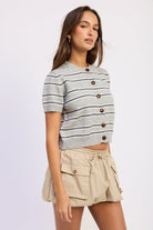 Side view of Varsity Lines short sleeve cardigan in Heather Grey Combo showing cropped fit and striped knit.