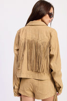 Woman wearing cropped suede-look jacket with collar and long sleeves in Latte.