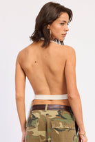 Ivory halter top with deep V neckline and tie waist back view