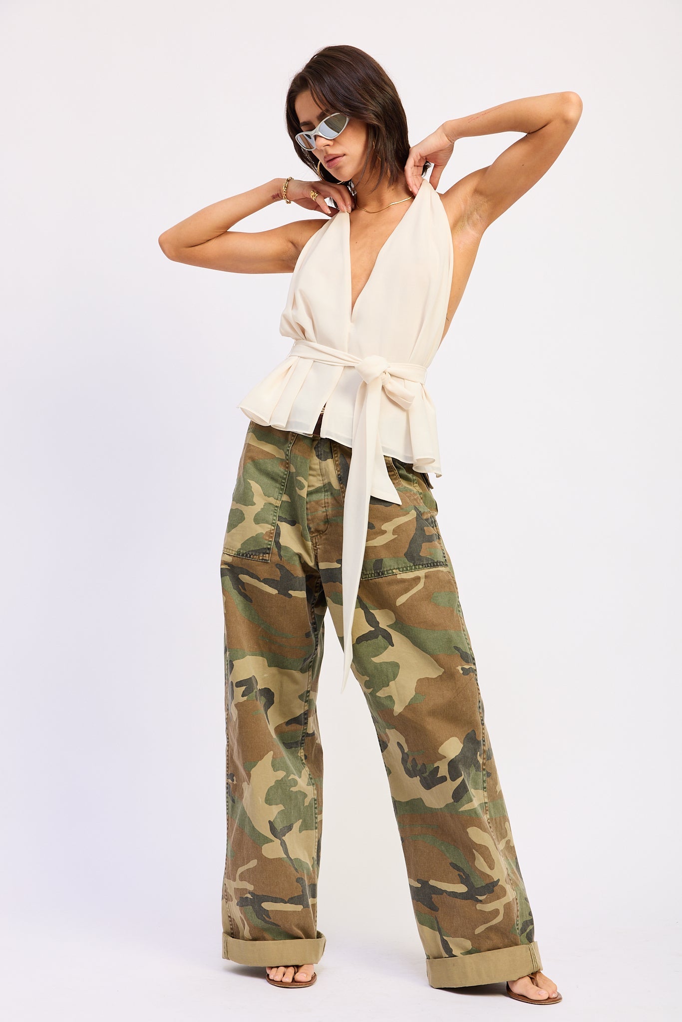 Ivory halter top with deep V neckline and tie waist front view