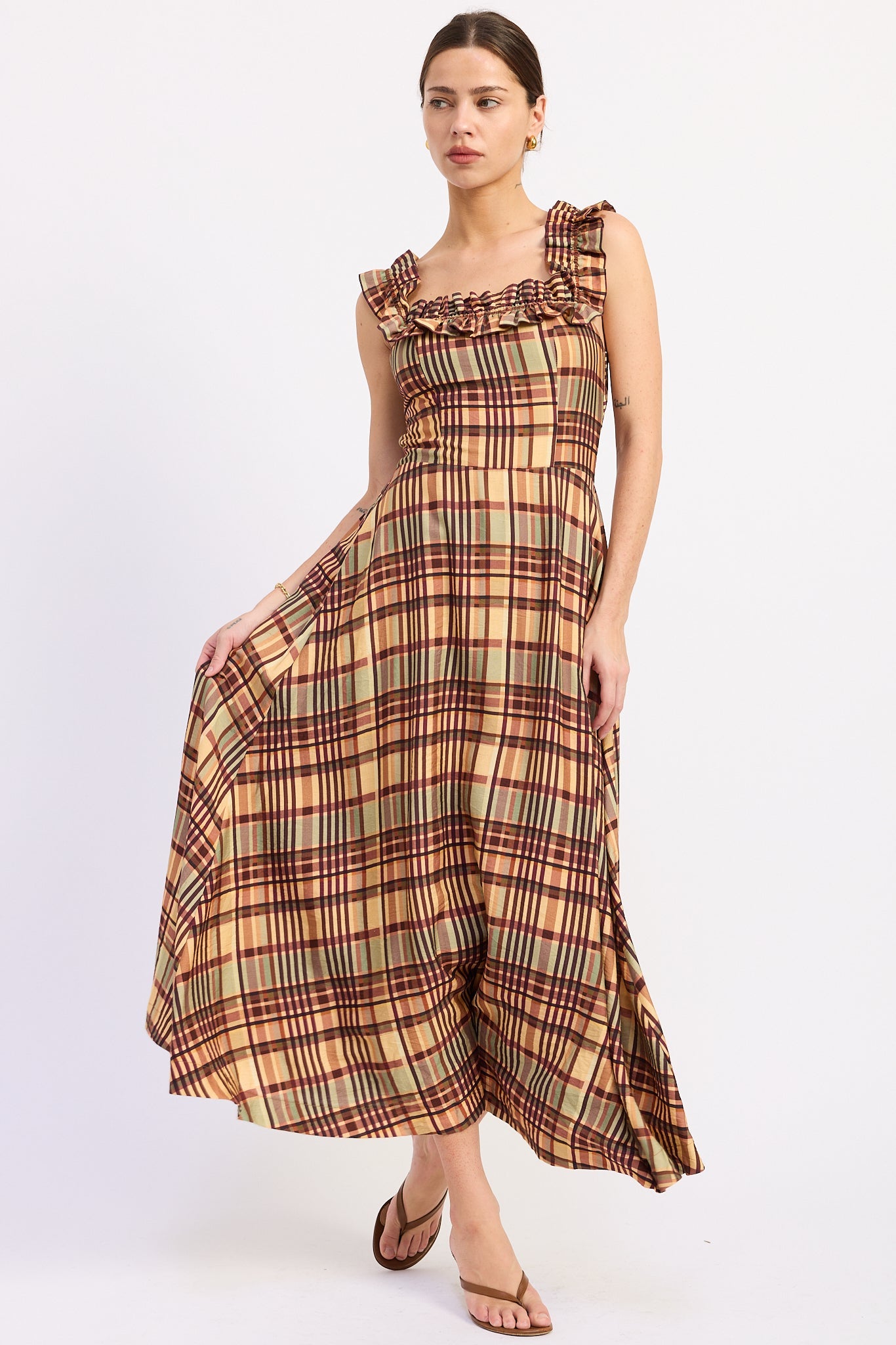 Autumn in Plaid Ruffle Midi Dress with multicolor fall plaid and full midi skirt, model holding skirt to show volume.