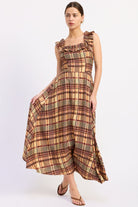 Autumn in Plaid Ruffle Midi Dress with multicolor fall plaid and full midi skirt, model holding skirt to show volume.