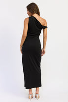 Black one shoulder maxi dress with asymmetrical draped neckline, back view.