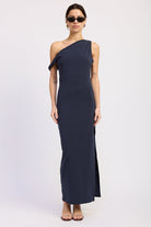 Navy one shoulder maxi dress with asymmetrical draped neckline and long fitted silhouette, front view.