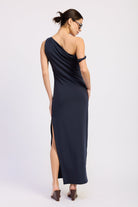 Navy one shoulder maxi dress with draped back neckline and high side slit, back view.