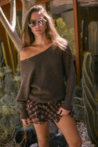 Sunday Soft Off Shoulder Sweater with a relaxed fit, wide neckline, long sleeves and ribbed trim.