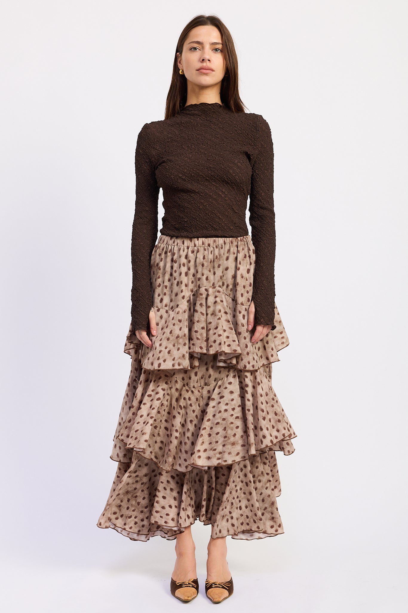 Sahara Spotted Ruffle Maxi Skirt in beige and brown animal print with oversized layered ruffles, front view.
