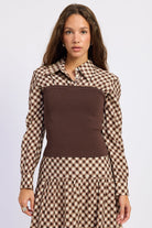 Thea espresso and ivory layered plaid collared top with fitted brown contrast knit body, front view.