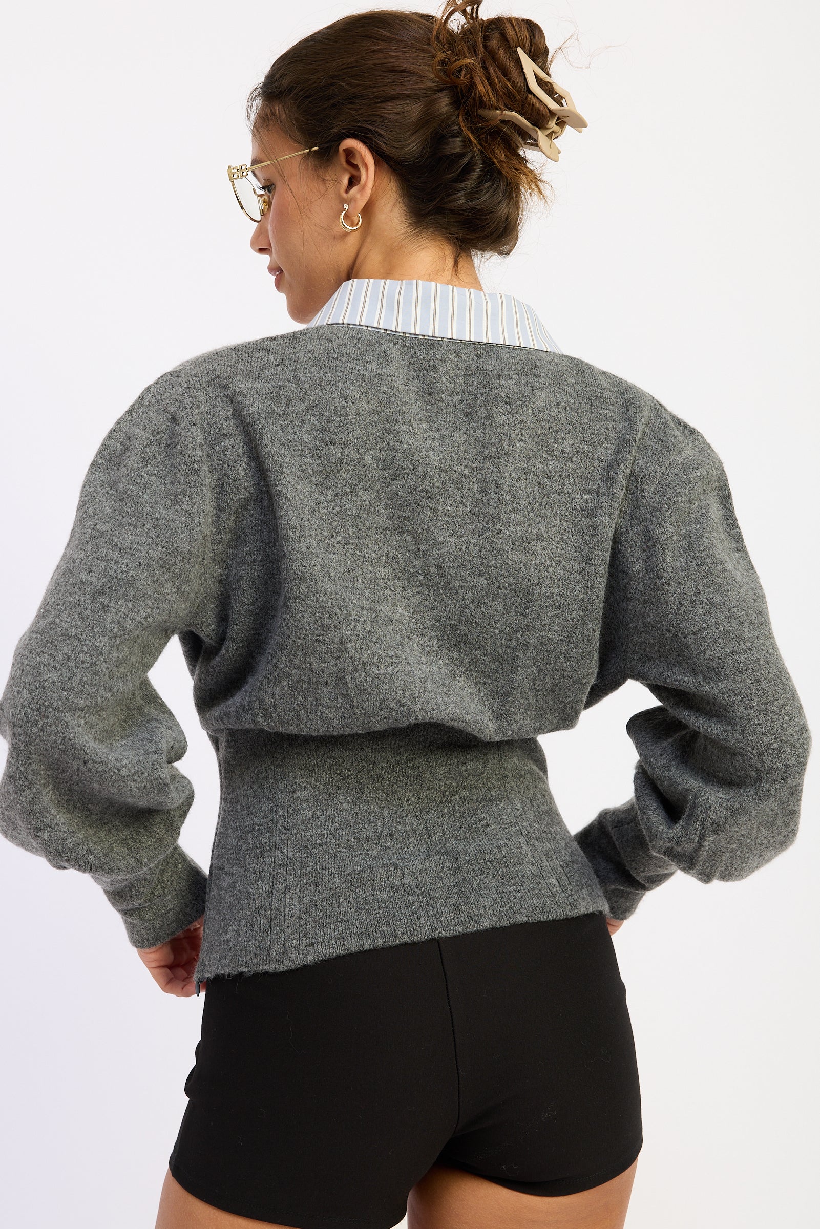 Back view of charcoal gray Cambridge Contrast Collar Sweater showing fitted waist panel and striped cotton collar.