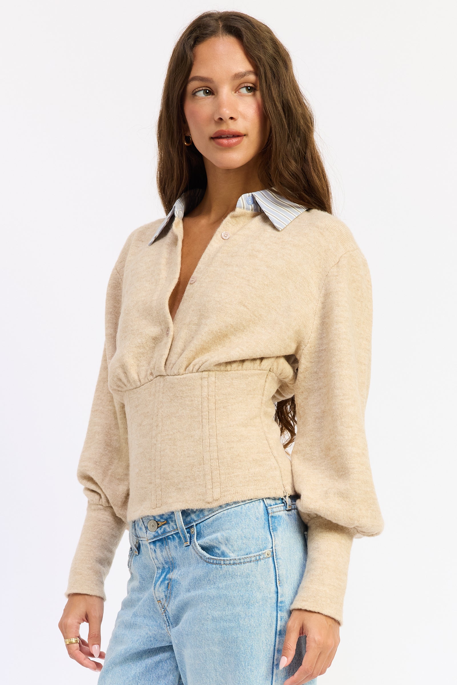 Close front view of oatmeal Cambridge sweater showing button neckline, gathered bust and wide fitted waist panel.