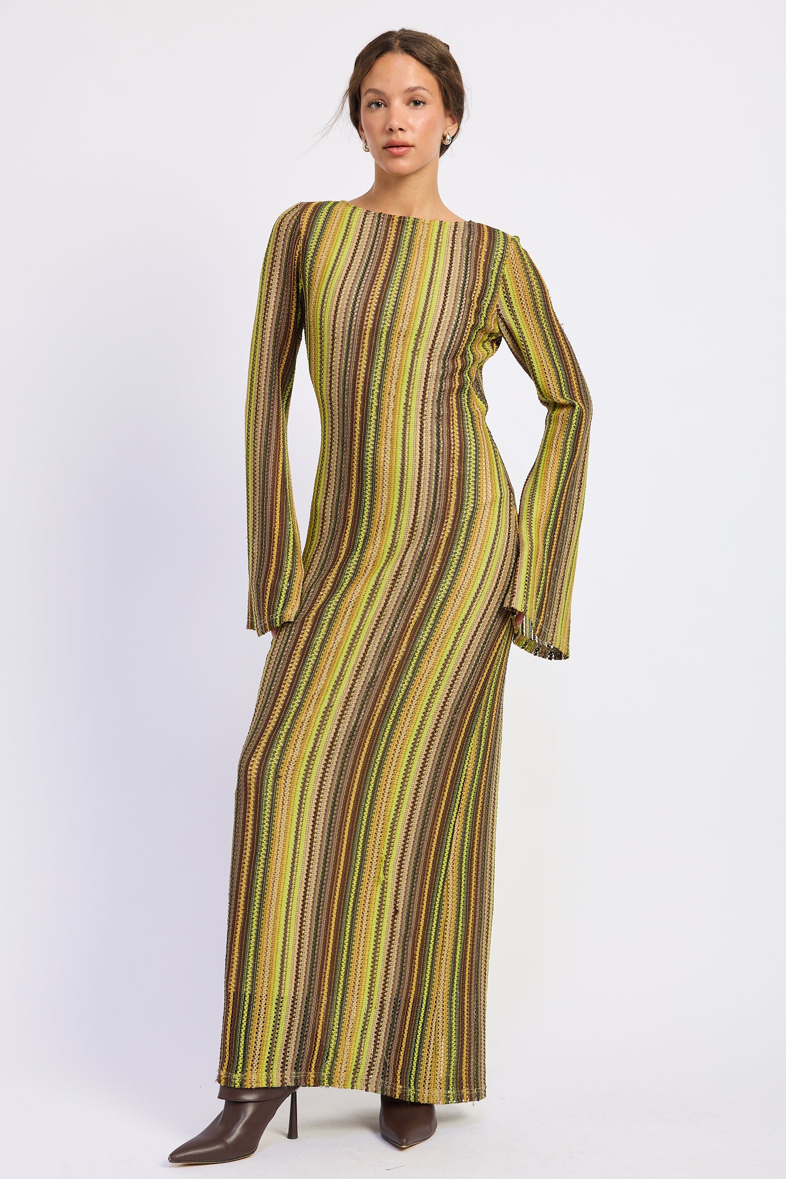 Full length front view of Solstice Stripe Long Sleeve Maxi Dress with retro inspired vertical stripes, fitted silhouette, and long bell sleeves.