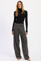 Madison Wide Leg Trousers in charcoal gray featuring front pleats, tailored waistband and full length wide leg silhouette.