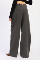 Back view of Madison Wide Leg Trousers in charcoal gray showing wide leg silhouette, belt loops and back welt pocket detailing.