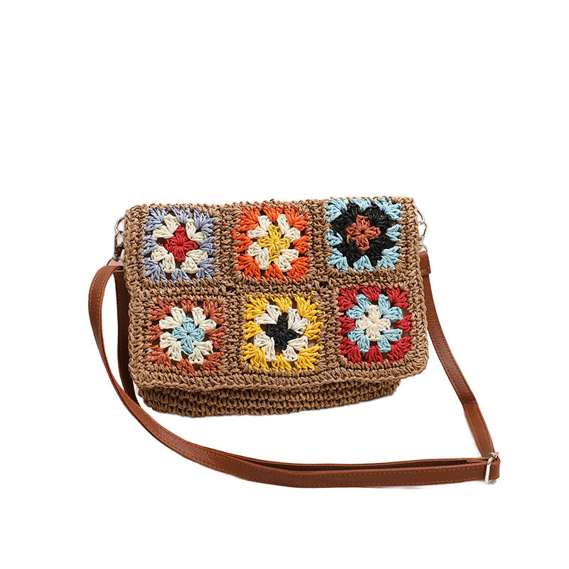 Model wearing straw khaki version of the bag with multicolor crochet squares-AVAH