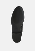 Black shoe sole on a white background