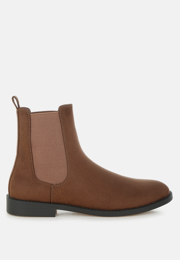 Brown Chelsea boot on a white background