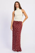 Maroon polka dot maxi skirt with cream dots and slim flared silhouette

