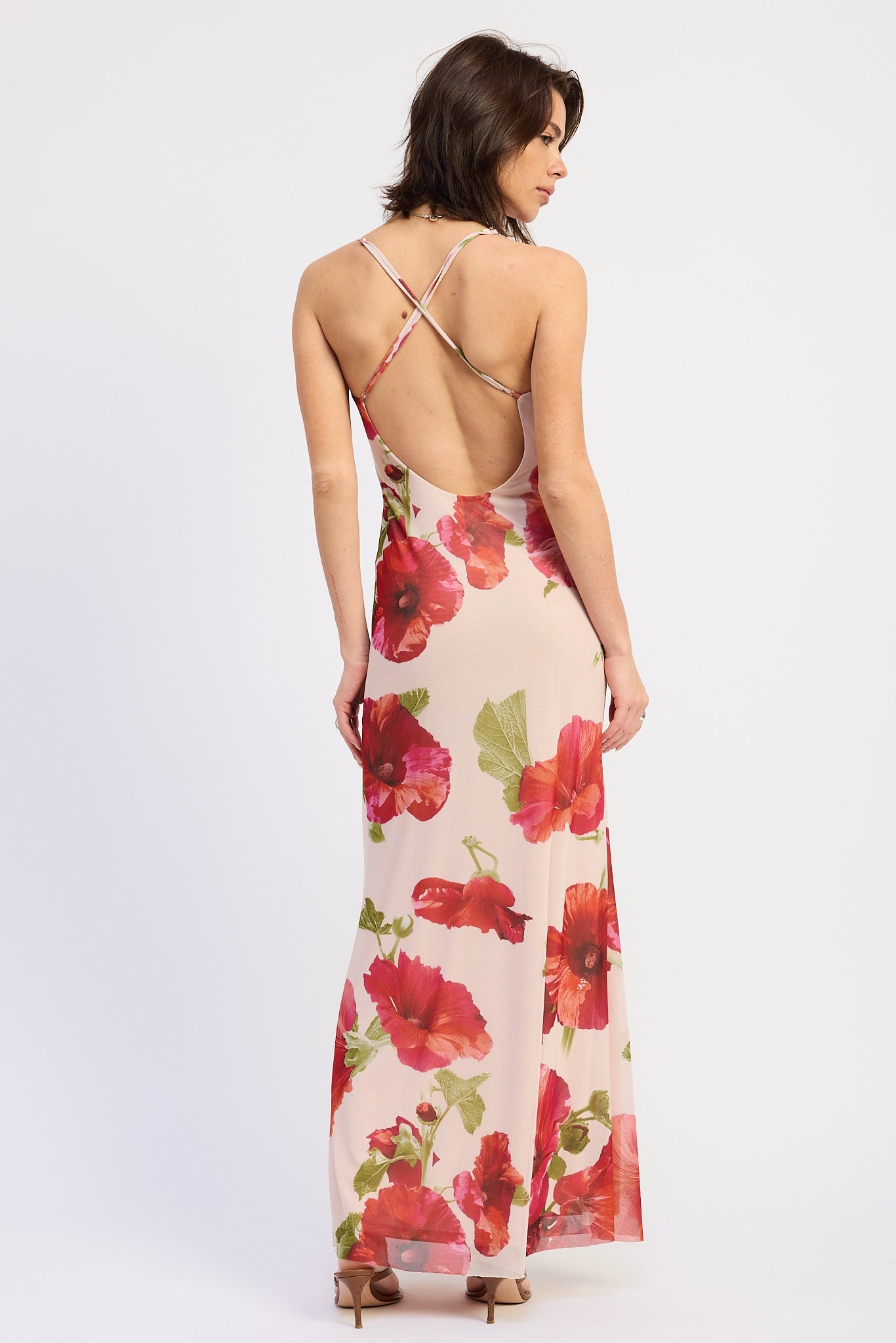 Back view of floral maxi dress showing open cross back and thin spaghetti straps, AVAH