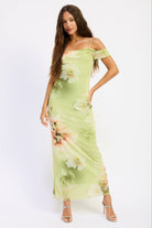 Soft green floral off shoulder maxi dress with ruched sleeves and fitted silhouette
